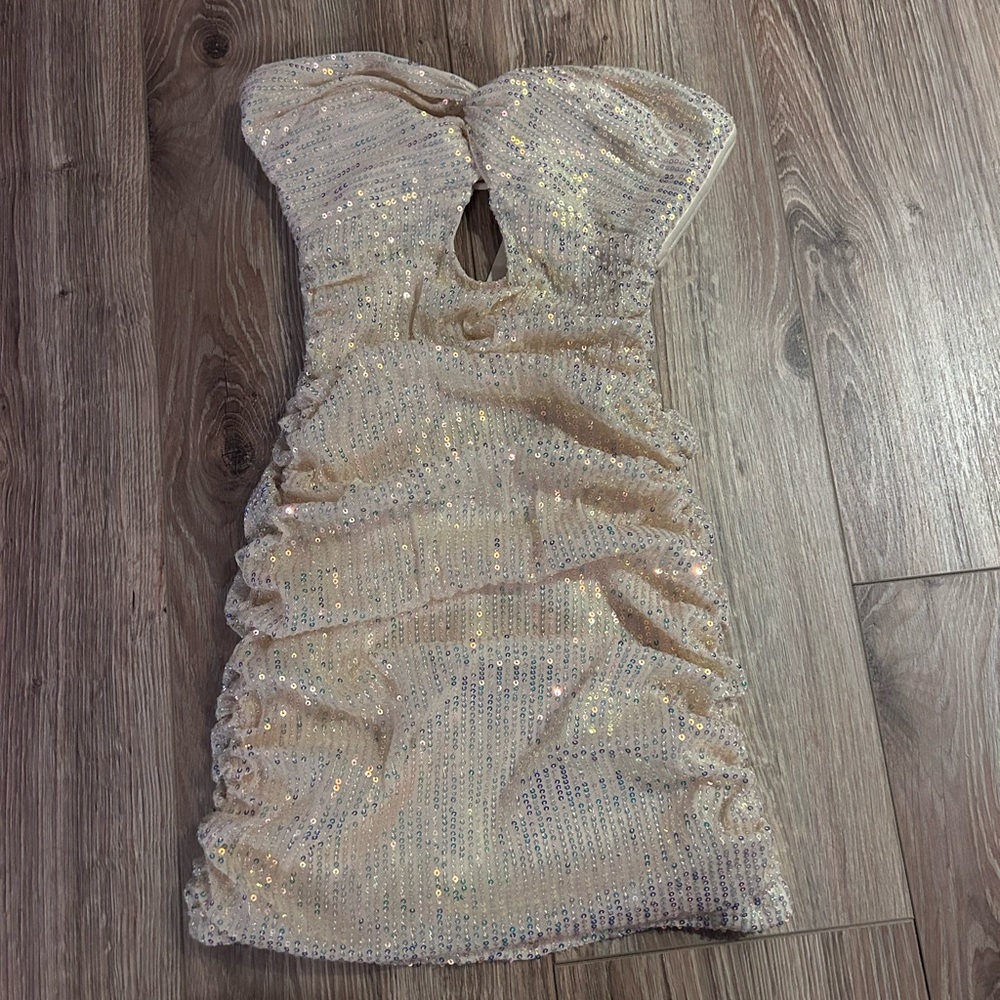 Lucy in the Sky- champagne key whole strapless dress!